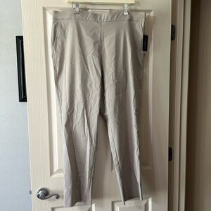 NWT tan slimming stretch long pants.